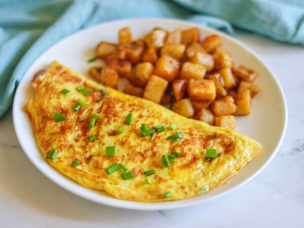 OMLETTE (ONIONS, TOMATOES, PEPPERS) W/ SIDE OF HOME FRIES